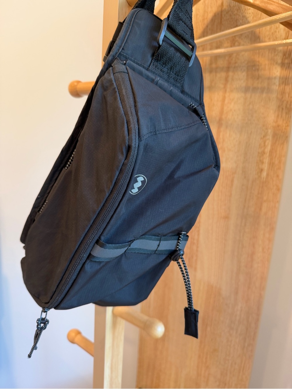 Unisex Janji Multipass Sling Bag in Black